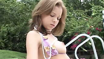 A Teenage Girl With Small Breasts Pleasures Herself By The Pool