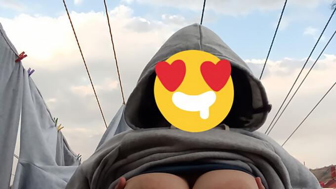 Amateur exhibitionist flaunts her assets to the neighborhood