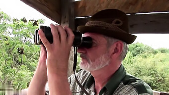 Older Man And Younger Woman Engage In Sexual Activity During A Hunting Trip